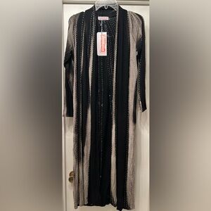 Long black and beige, open-front cardigan/duster with jewel embellishments.